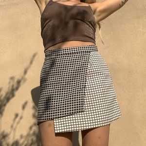 ASYMMETRICAL HIGH WAISTED SKIRT